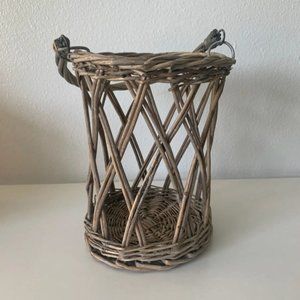 Antique wicker candle holder